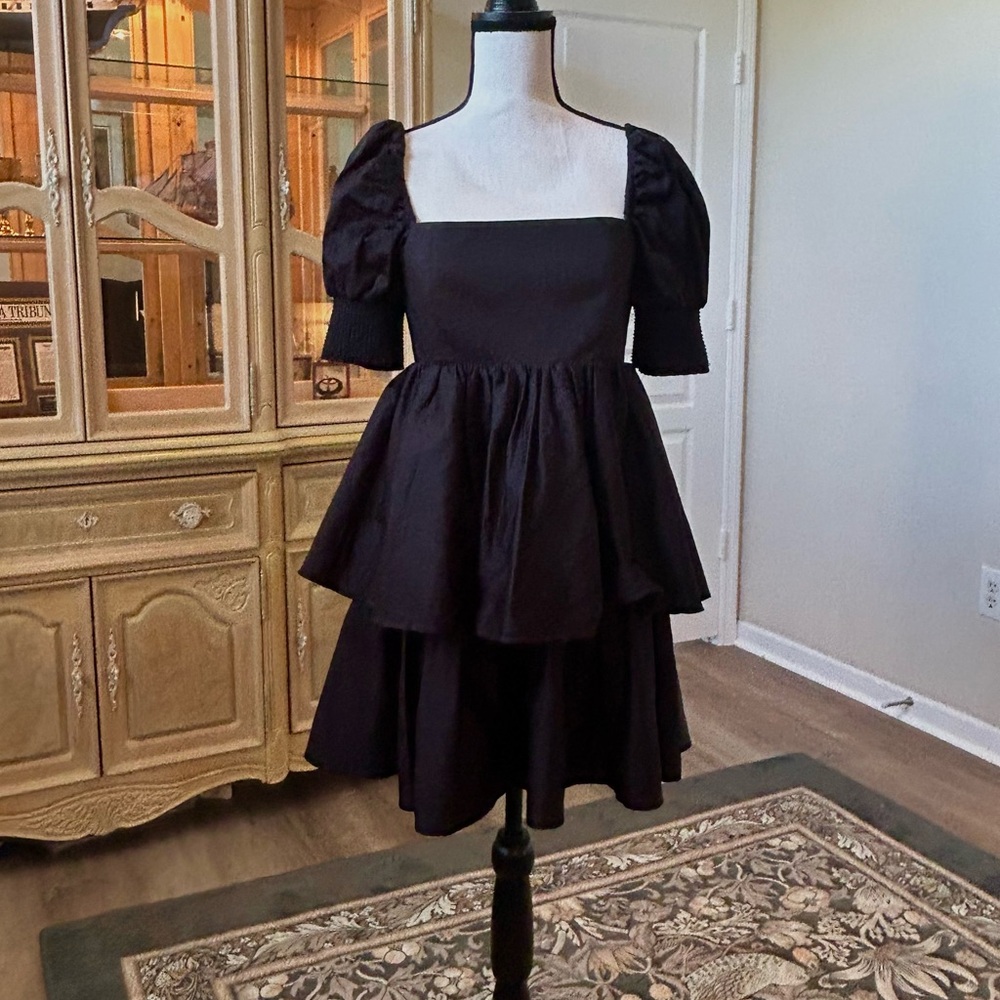 Alice + Olivia, black tiered puff sleeve mini dress.